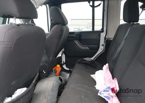 2015 Jeep Wrangler Unlimited Willys Wheeler из США, поврежденный, VIN 1C4BJWDG4FL564614